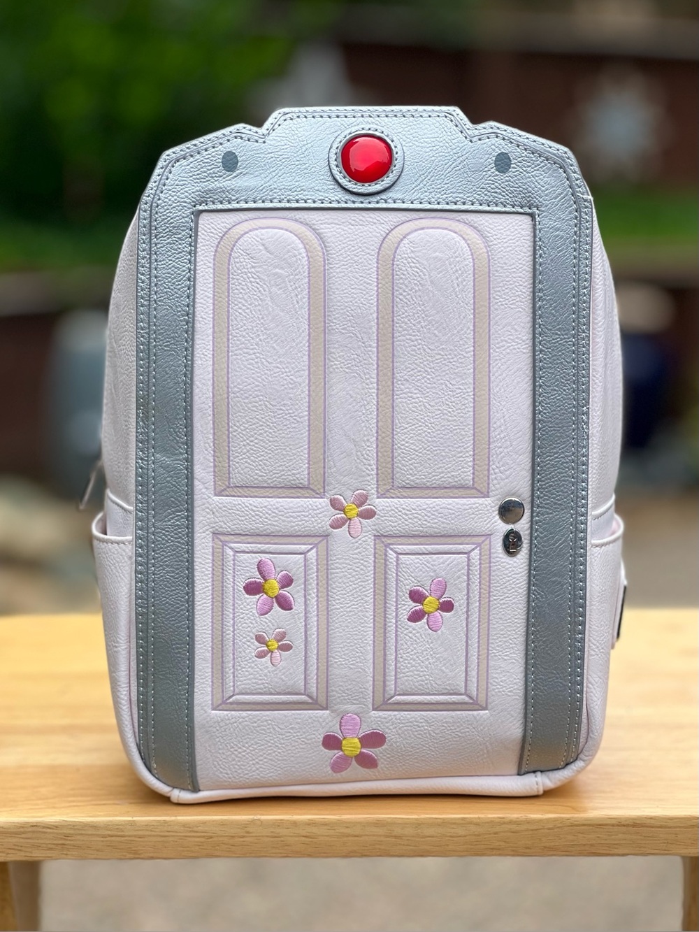Loungefly Disney Pixar Monsters Inc Light Up Boo's Door Mini Backpack NWT